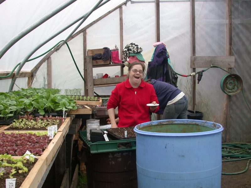 girl in greenhouse