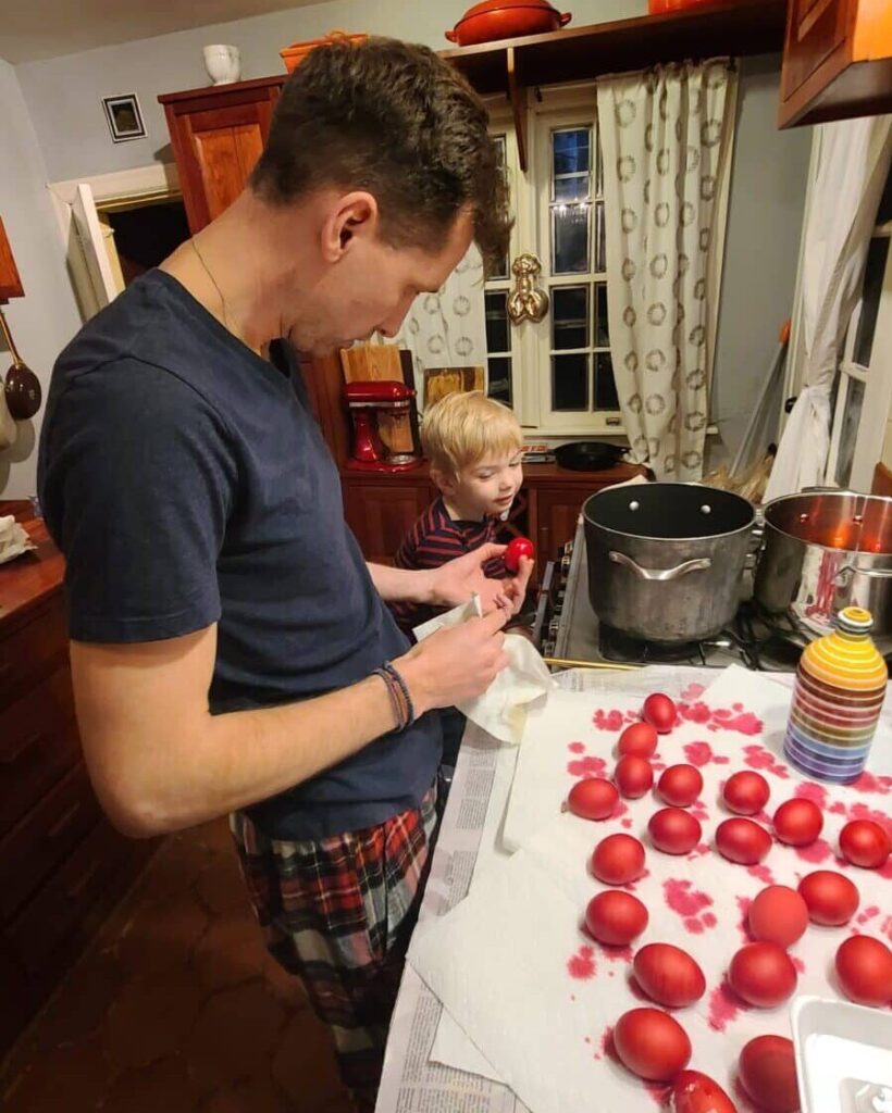Father and son making Greek Easter Eggs