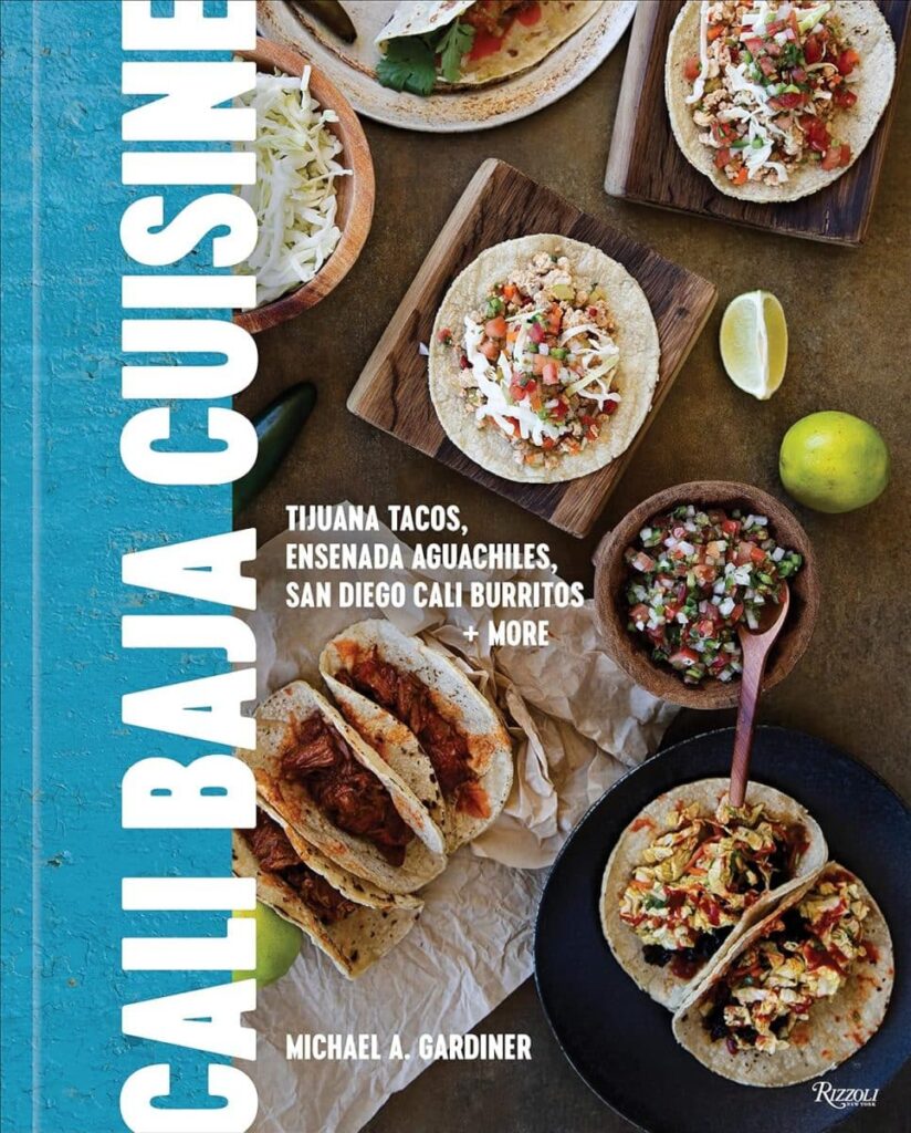 Cover of the "Cali-Baja Cuisine" cookbook showcasing various taco dishes with the book title and author name.