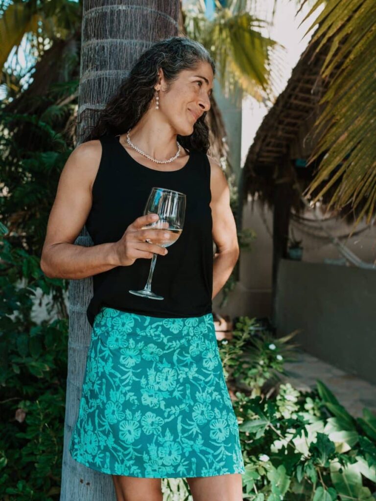 Woman wearing a RipSkirt in Hibiscus Green