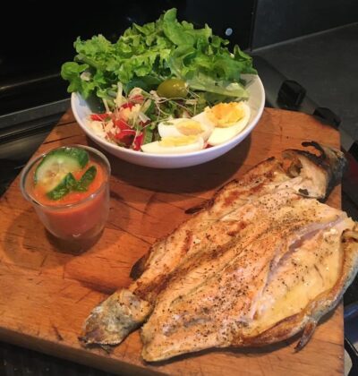 fish on the grill with gazpacho and salad