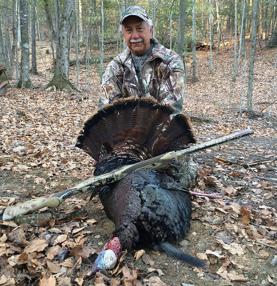 Michael Yacino and a large tom turkey.
